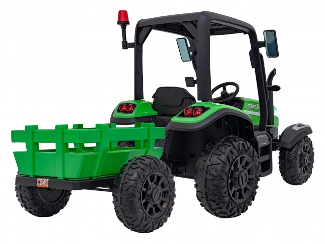 Detský traktor so zeleným prívesom