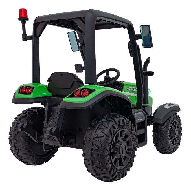 Detský traktor so zeleným prívesom