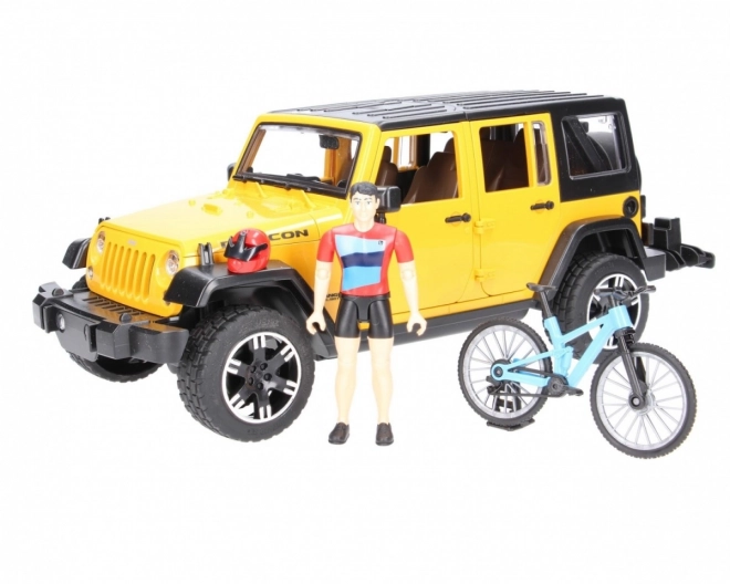 Jeep Wrangler Rubicon Unlimited s horským bicyklom a cyklistom