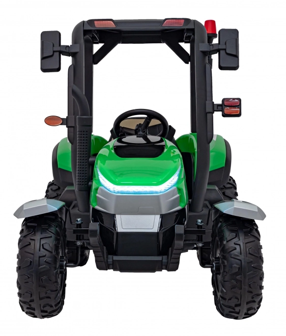 Detský traktor so zeleným prívesom