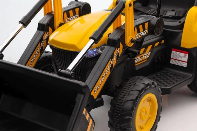 Traktor na akumulátor s lyžicou žltý