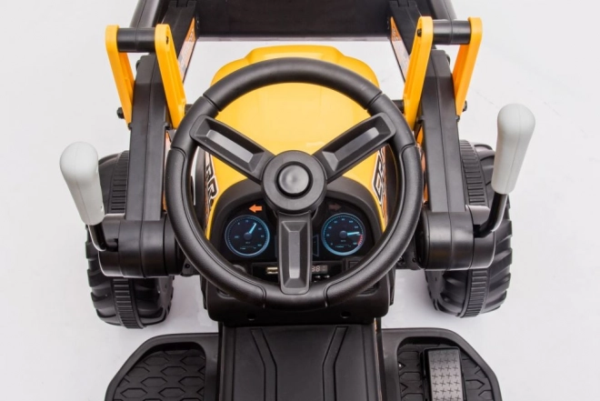 Traktor na akumulátor s lyžicou žltý