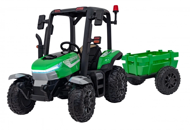 Detský traktor so zeleným prívesom