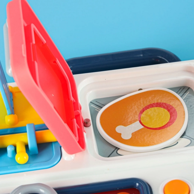 Montessori manipulačná tabuľa s kuchynskými prvkami a učiacim sa hodinami