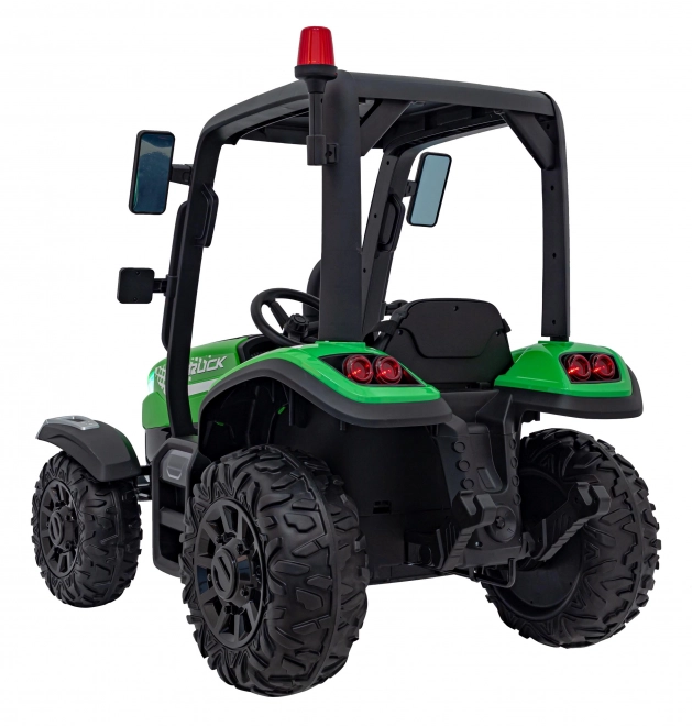 Detský traktor so zeleným prívesom