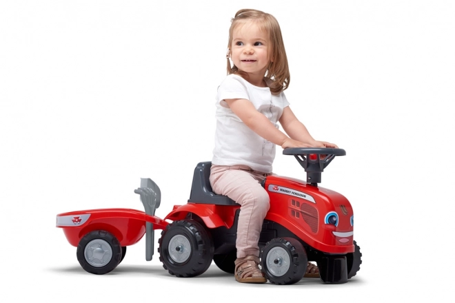 Odstrkovací traktor Massey Ferguson červený s volantem