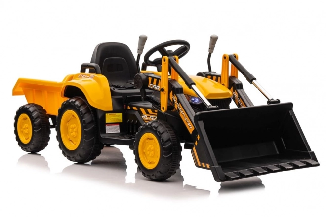 Traktor na akumulátor s lyžicou žltý