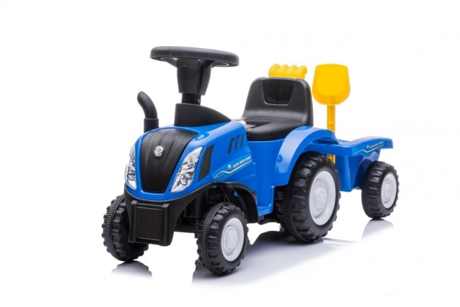 Odrážadlo traktor New Holland modrý