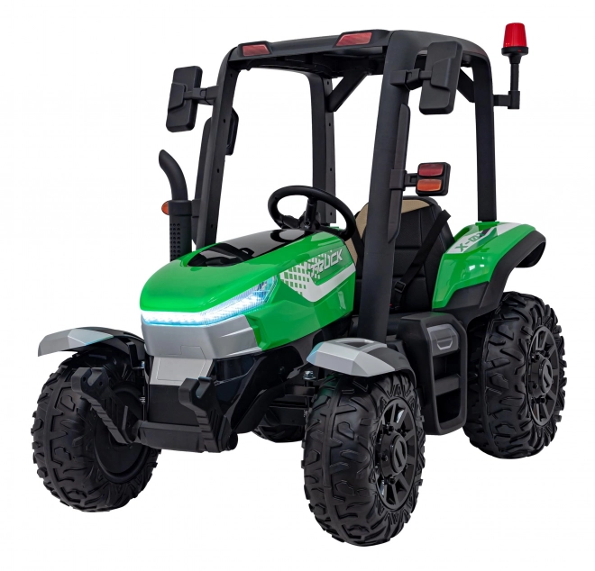 Detský traktor so zeleným prívesom