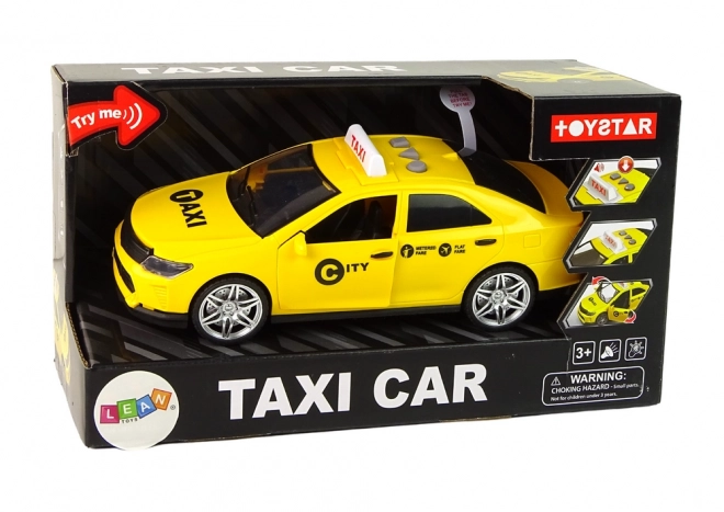 Auto taxi so svetlami a zvukmi