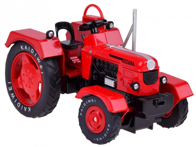 Červený kovový traktor s prívesom 1:18