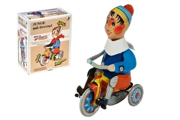 Chlapec na trojkolke na kľúčik kov 15cm v krabici Kovap