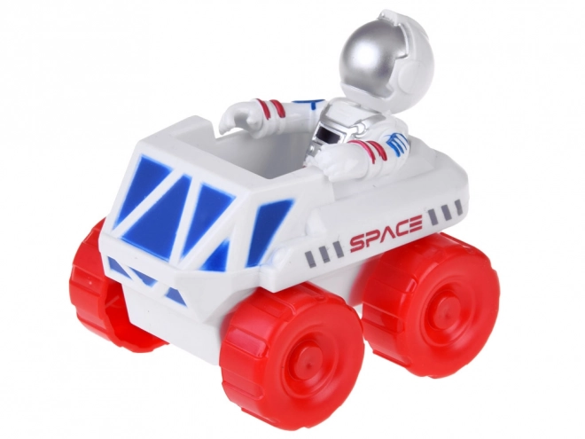 Kosmická základňa s raketou a astronautmi