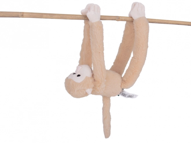 Závesný maskot opice bielej farby