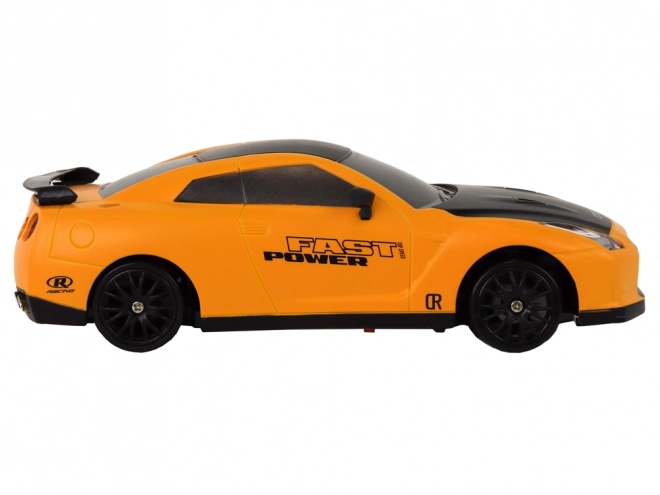 Diaľkovo ovládané športové auto R/C 1:24 s vymeniteľnými kolesami – Žltá