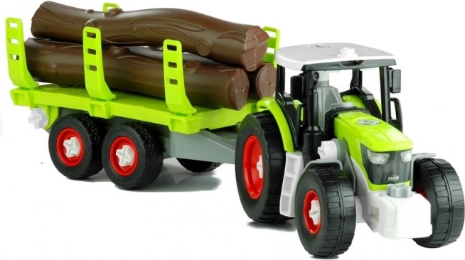 Skladací traktor s vlekom na drevo