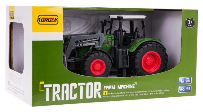 Zelený traktor so sklápacou radlicou