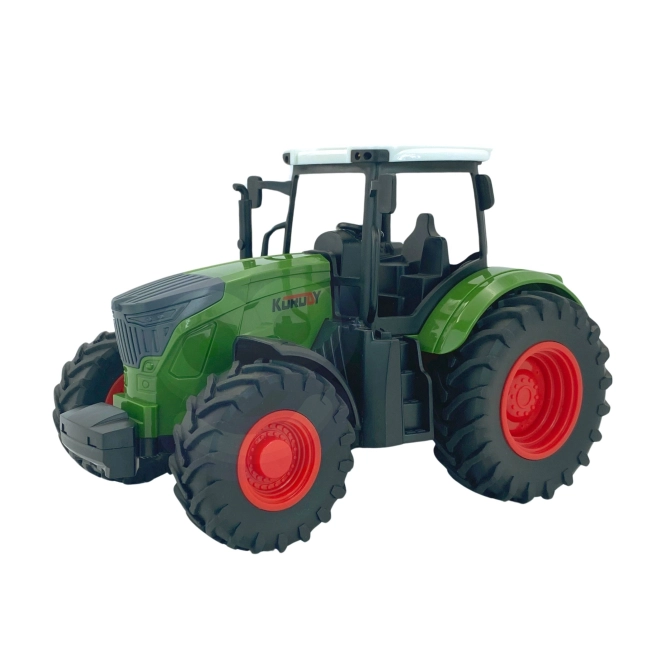 Zelený traktor s gumovými kolesami