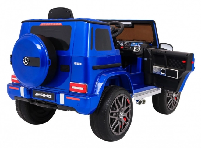 Modrý lakovaný detský Mercedes AMG G63 s diaľkovým ovládaním, MP3, LED svetlami a pásmi
