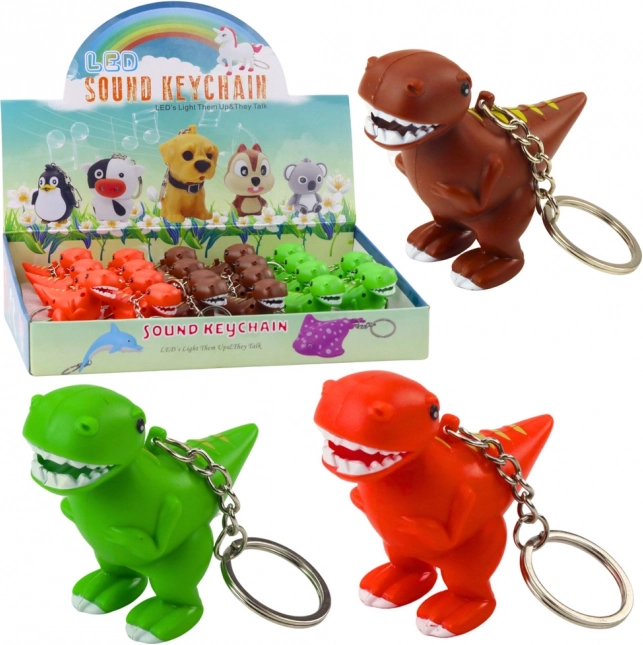 Prívesok na kľúče dinosaurus s LED svetlom a zvukom