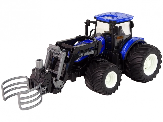 Traktor na diaľkové ovládanie s uchopovačom
