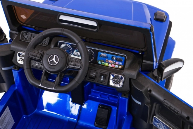 Modrý lakovaný detský Mercedes AMG G63 s diaľkovým ovládaním, MP3, LED svetlami a pásmi