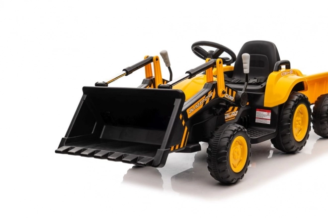 Traktor na akumulátor s lyžicou žltý