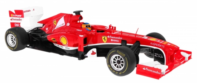 Ferrari F138 Rastar model 1:12 z diaľkovým ovládaním + pilot 2,4 GHz