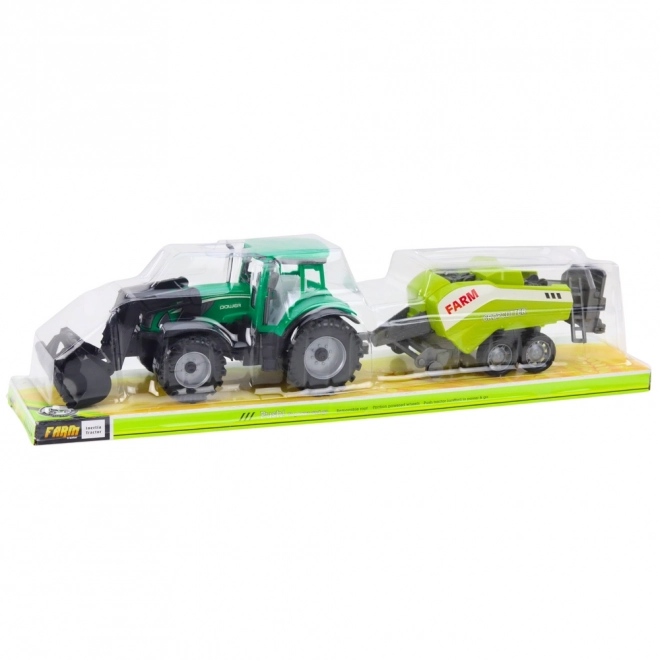 Zelený traktor s nakladačom a kompatibilným lisom na balíky