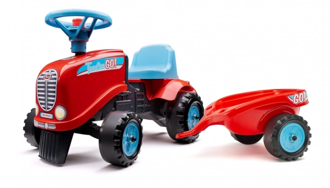 Odstrkovadlo - traktor Go Farm červené s volantom a vlečkou