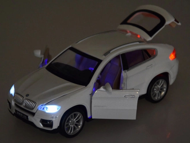 Kovové auto BMW X6 SUV 1:32 svetlo a zvuk