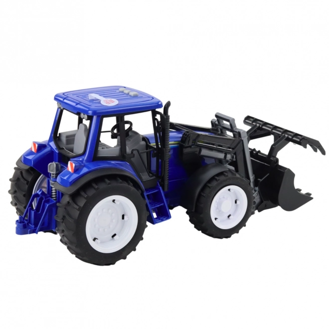Detský traktor s pohyblivou lyžicou modrý