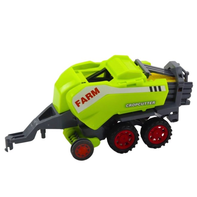 Súprava traktor s lisom na balenie sena zelený