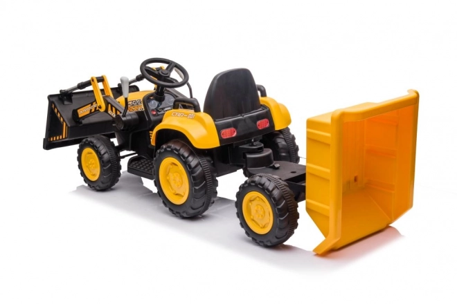 Traktor na akumulátor s lyžicou žltý