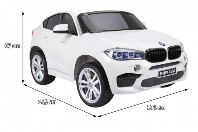 BMW X6M XXL pro 2 deti Biela + diaľkové ovládanie + eko koža + bezpečnostné pásy + pomalý rozjazd + MP3 USB + LED