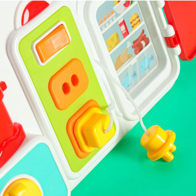 Montessori manipulačná tabuľa s kuchynskými prvkami a učiacim sa hodinami