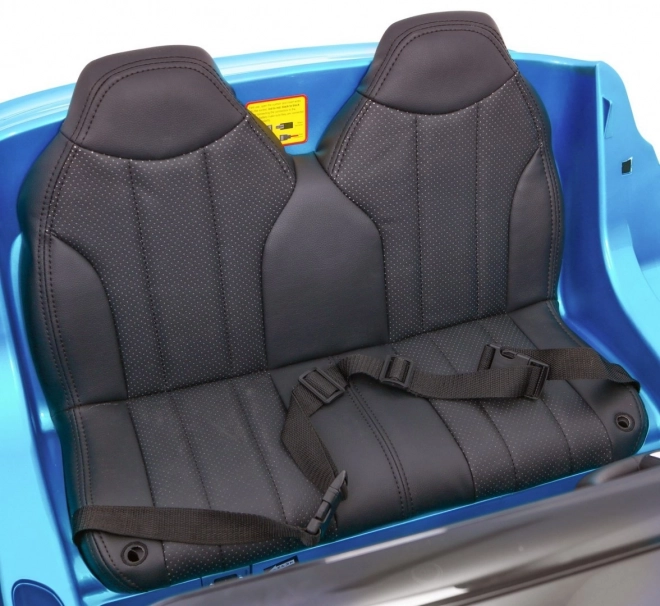 BMW X6M XXL pro 2 deti Modrá farba + Pilot + Eco koža + Bezpečnostné pásy + Pomalý štart + MP3 + LED