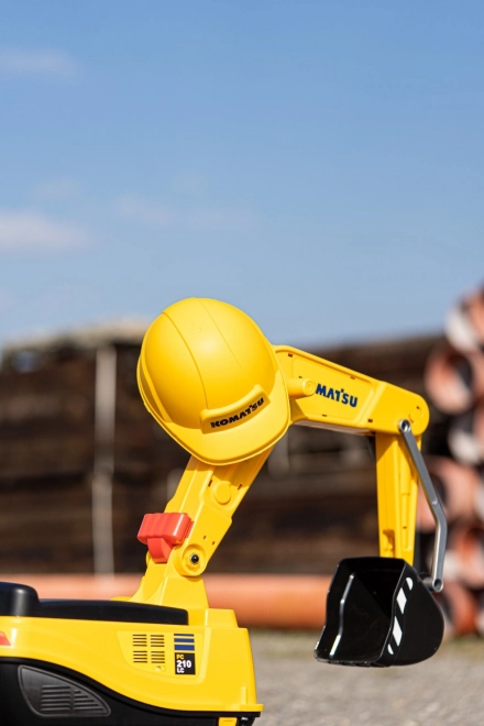 Detská otáčajúca sa bager Komatsu s helmou