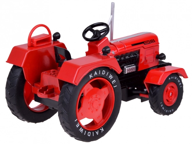 Červený kovový traktor s prívesom 1:18