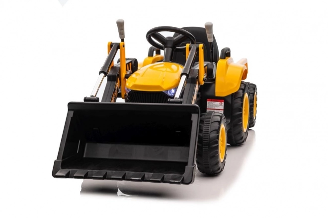 Traktor na akumulátor s lyžicou žltý