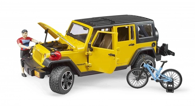 Jeep Wrangler Rubicon Unlimited s horským bicyklom a cyklistom