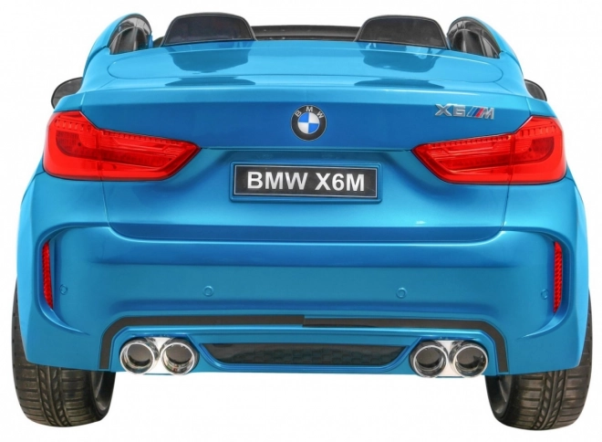 BMW X6M XXL pro 2 deti Modrá farba + Pilot + Eco koža + Bezpečnostné pásy + Pomalý štart + MP3 + LED