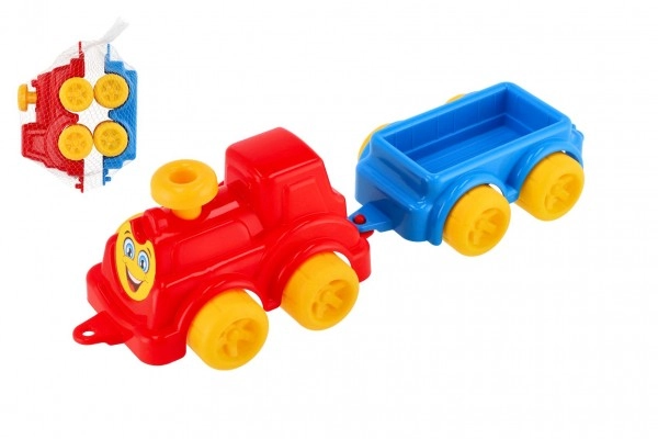 E-shop Teddies Lokomotiva/Vlak s vagonem plast v síťce 21x13x22cm 12m+