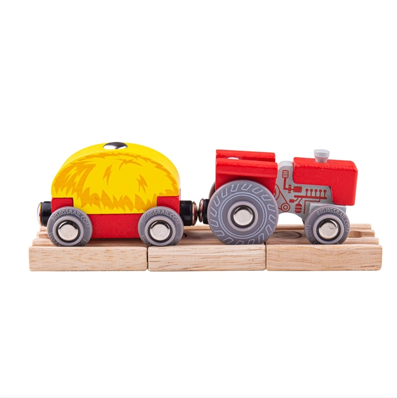E-shop Bigjigs Bigjigs Rail Červený traktor s prívesom Rail