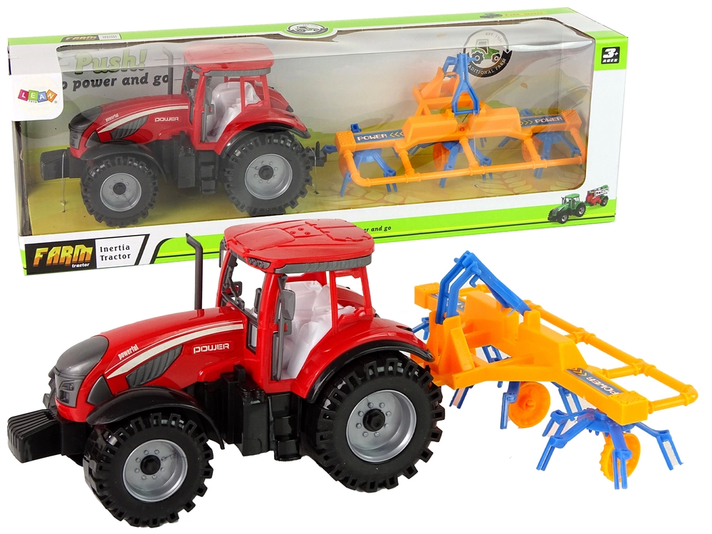 E-shop Lean Toys Červený traktor s hrabľami – trecí pohon