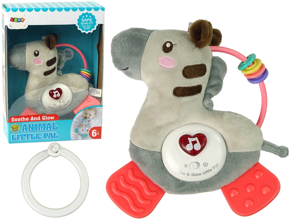 E-shop LEAN TOYS Interaktívna hrkálka Zebra s melódiou