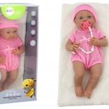 Bábika bábätko v ružovom oblečení s čiapočkou, cumlíkom a dečkou