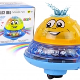 Veselý žltý UFO Loptička so Svetlom a Hudbou na Kúpel