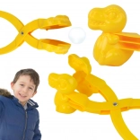 Snehový tvorca – dinosauří výrobník snehových gúľ, žltý