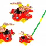 Veselá hračková helikoptéra s tyčou